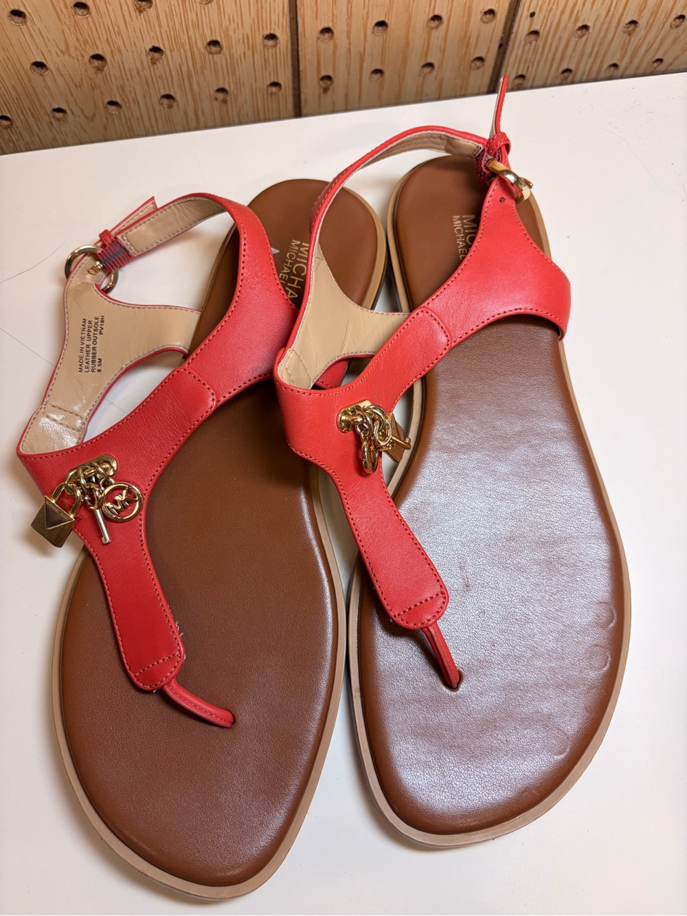 Michael Kors Coral Red T-Strap Leather Sandals with Gold Charm